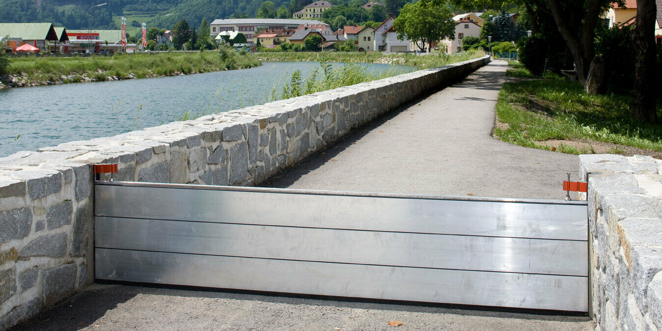 PREFA flood protection installed next to a river 