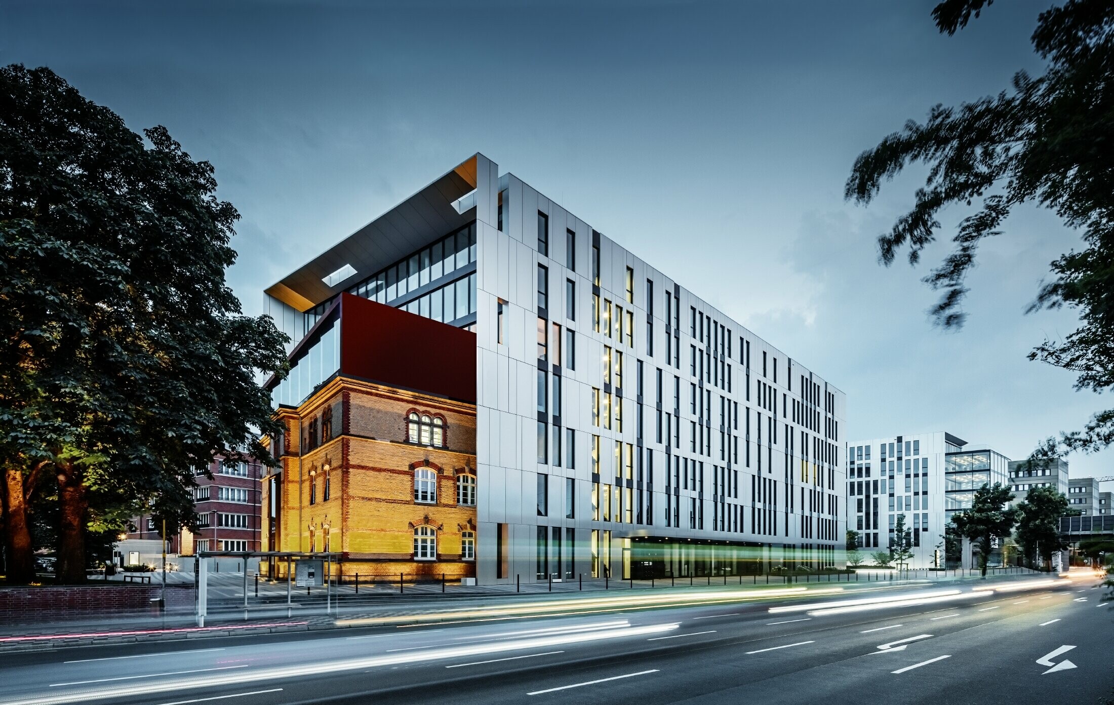 Futuristic aluminium façade made of aluminium composite panels in brushed aluminium on the Clara and Robert building complex s in Düsseldorf (Germany).