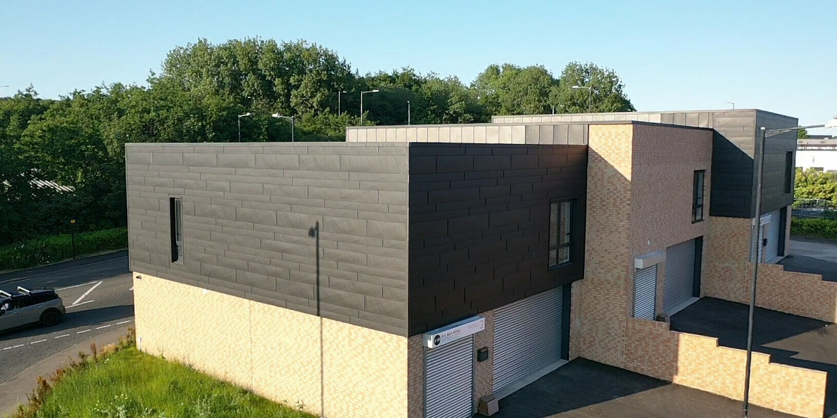 Just Hard Metals company building with façade made of PREFA Siding.X and bricks