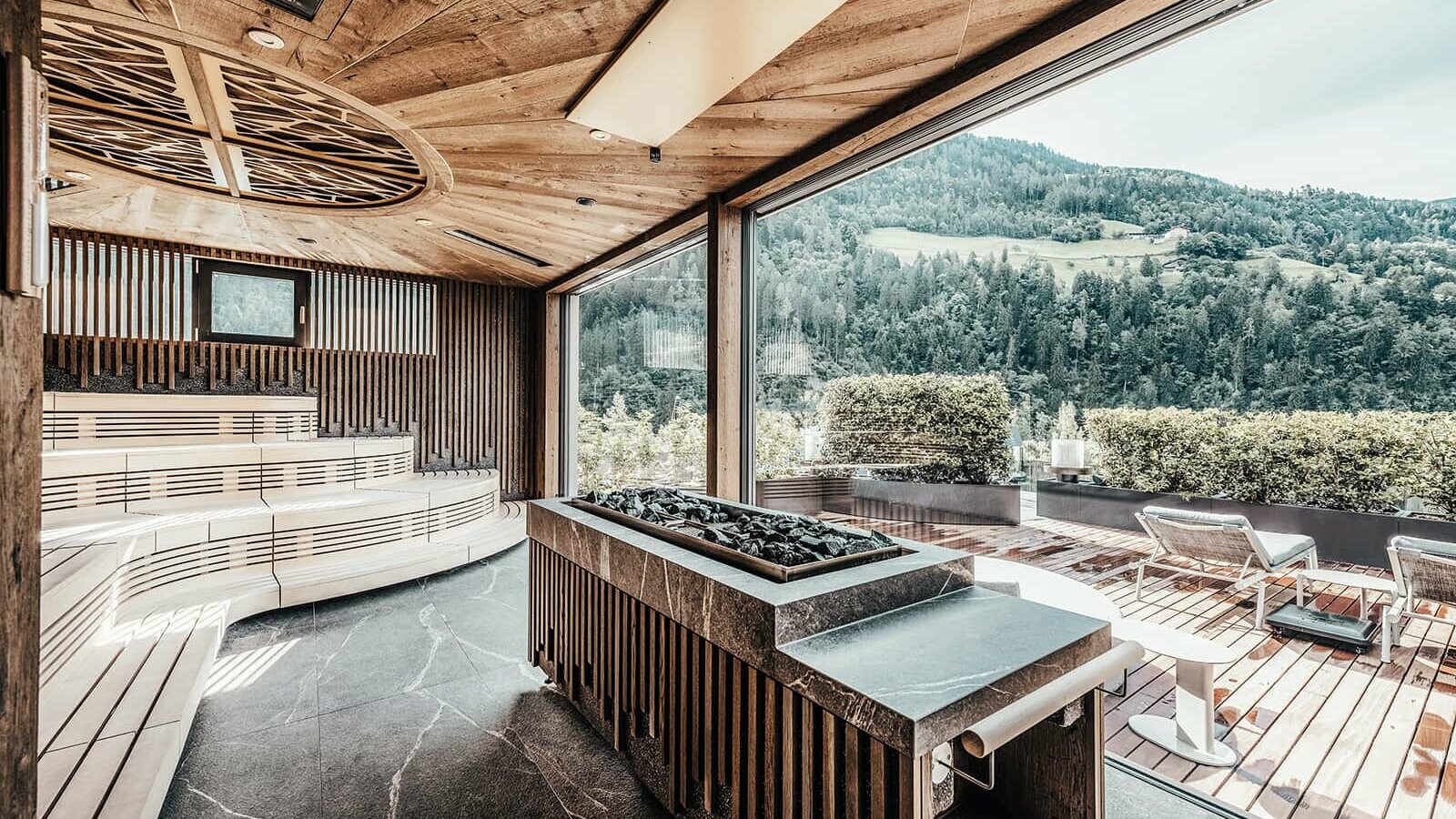 A picture of the sauna area in the hotel with a rural view