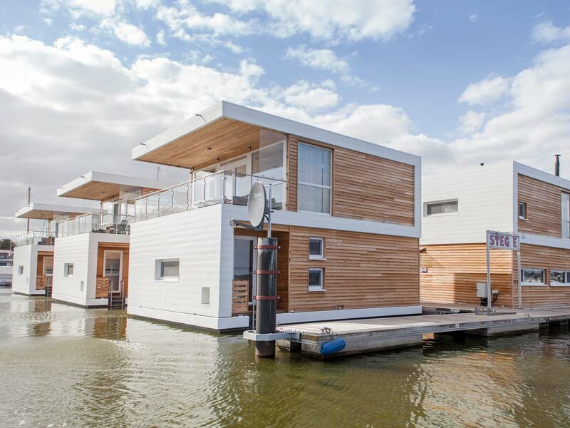 Houses on the waterfront clad with PREFA aluminium products