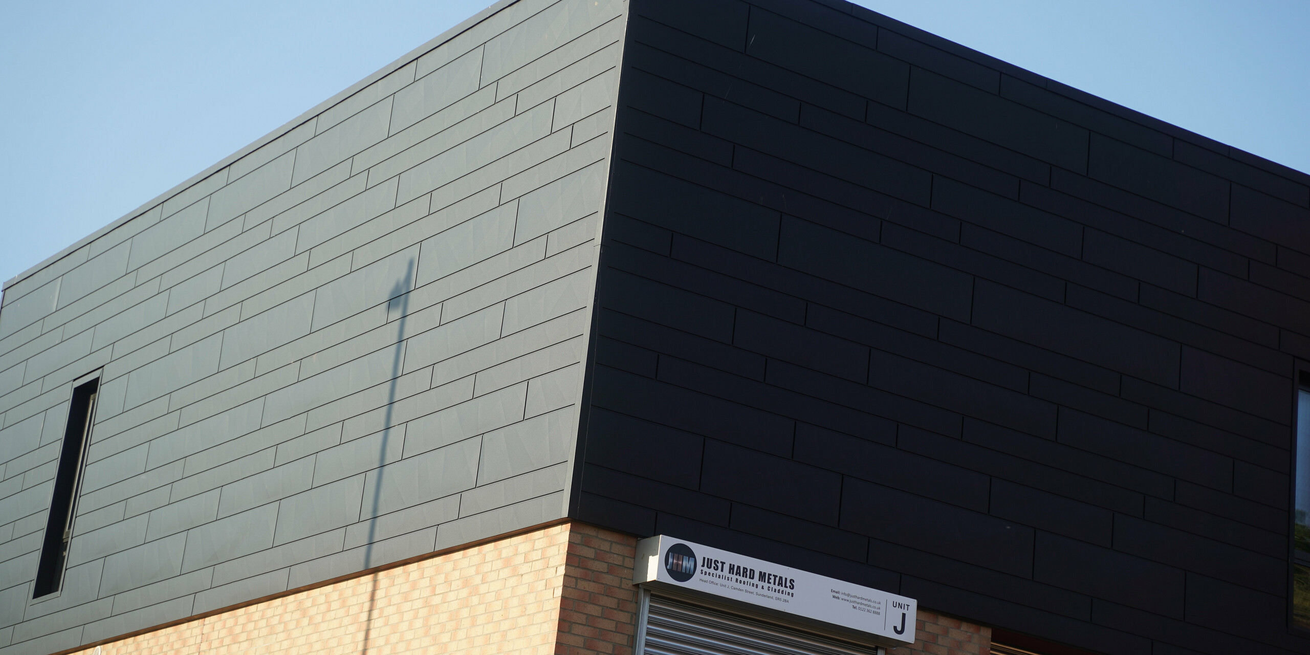 Building corner of the JHM office in Sunderland with PREFA Siding.X façade