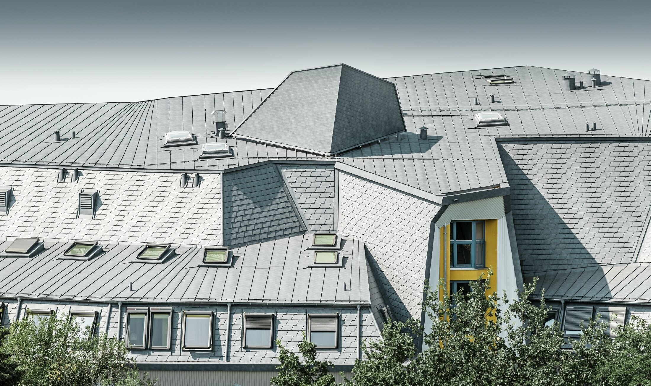 renovated roof with various roof windows, detail, aluminium roof made of Prefalz and PREFA shingles