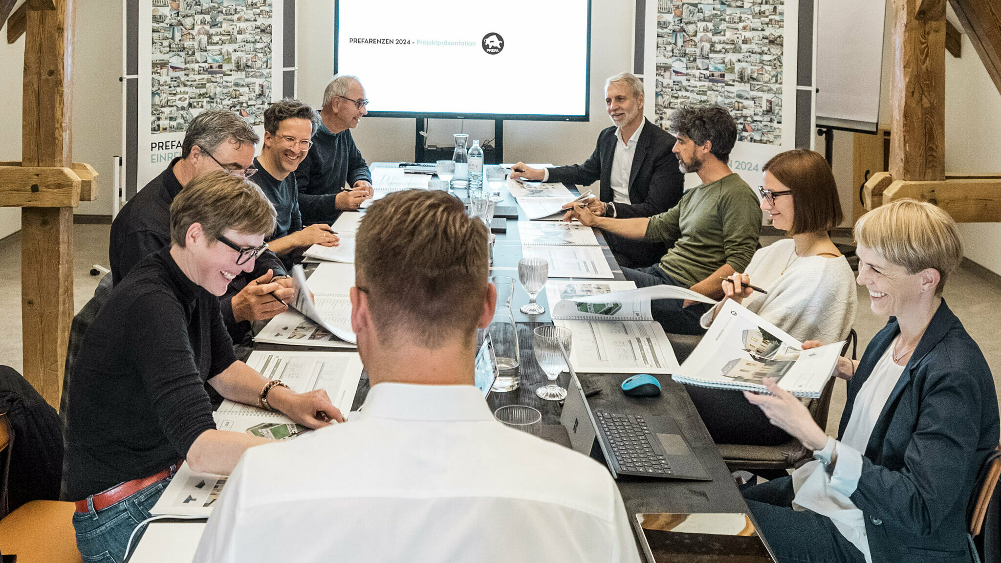 The jury discussing the projects.