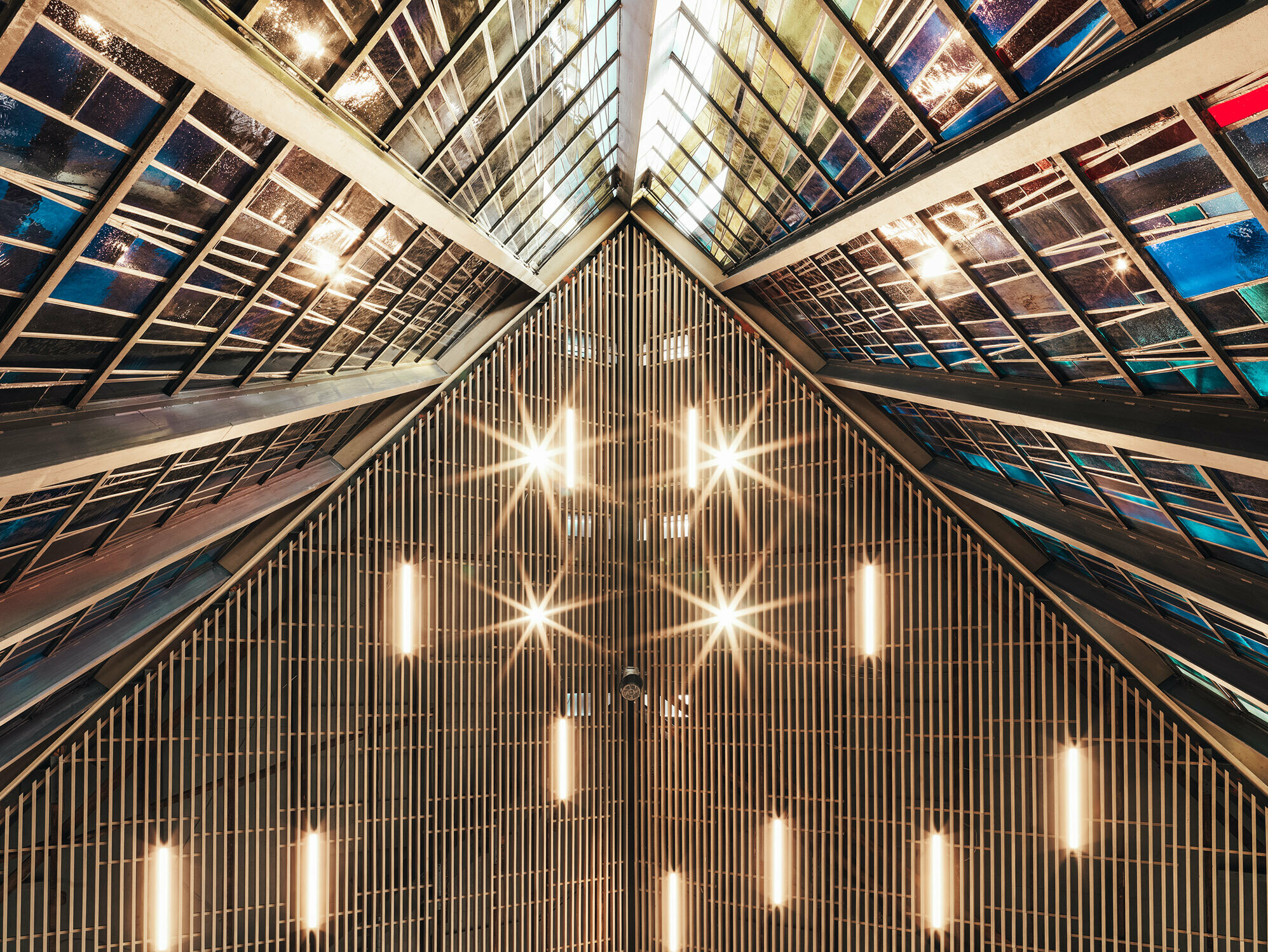 Inside, the special glass art can be seen in the shining light.
