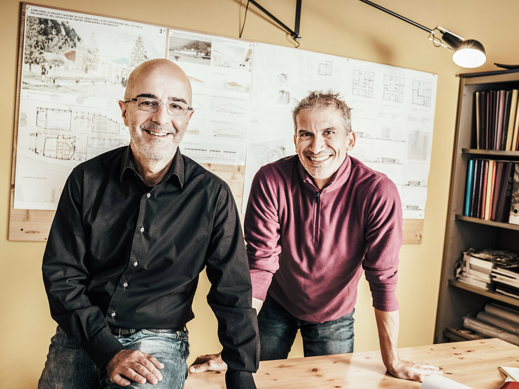 Portrait of the architects in their studio.