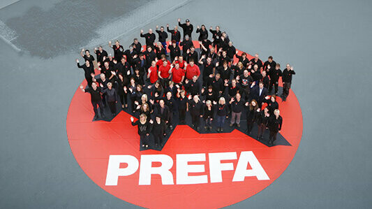 Shot of PREFA contact persons waving.