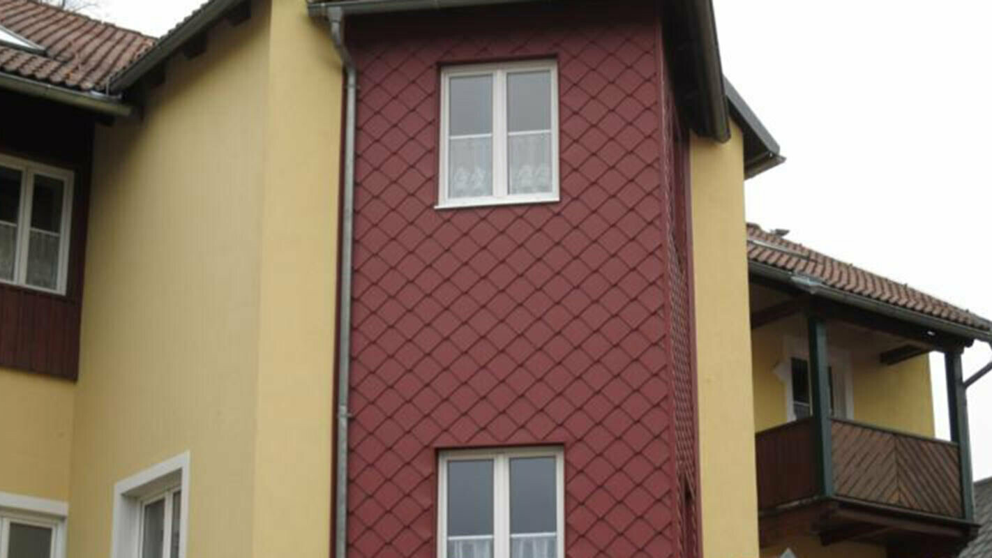 Façade with PREFA rhomboid façade tiles