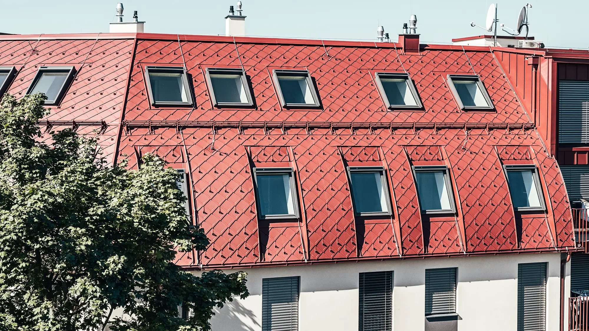 Various views and close-ups of the building's roofscape.