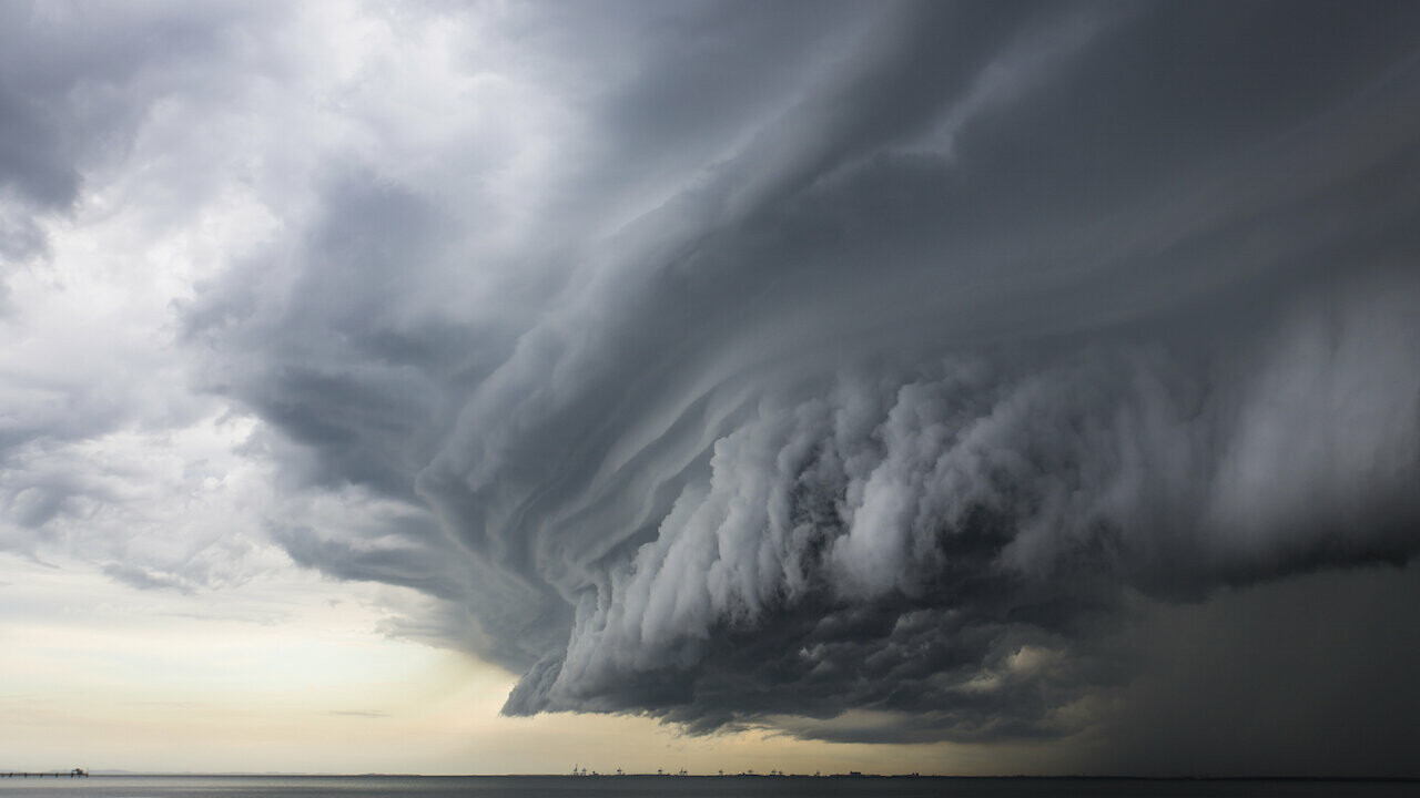 A storm is brewing. The sky is covered with dark clouds.