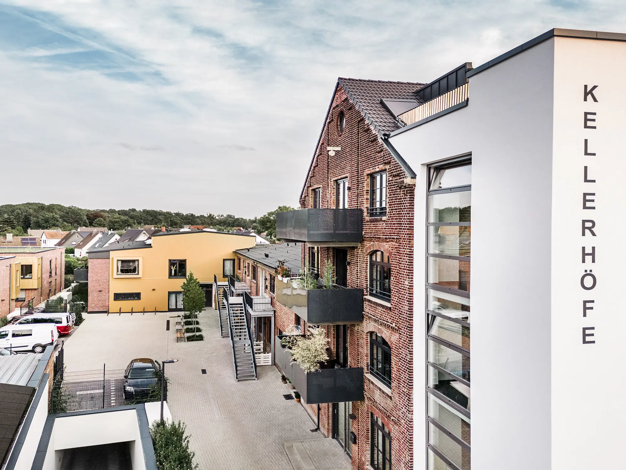 A view of the Kellerhöfe site from a bird's eye view from the side, with the word "KELLERHÖFE" written vertically on the building to the right.