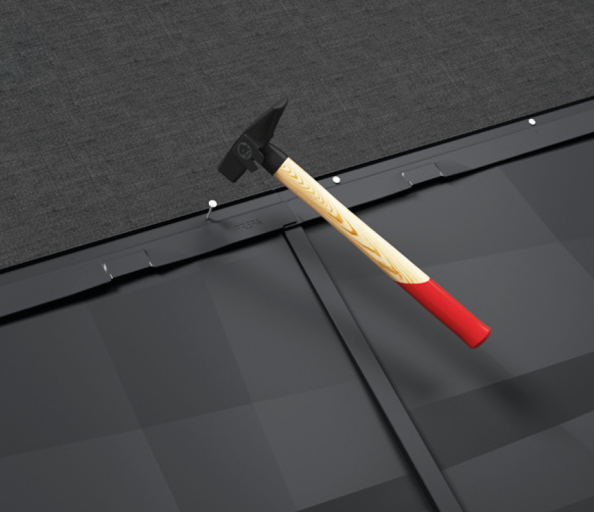 The PREFA roof panel FX.12 is fastened with nails to the substructure by means of a fastening strip on the product.