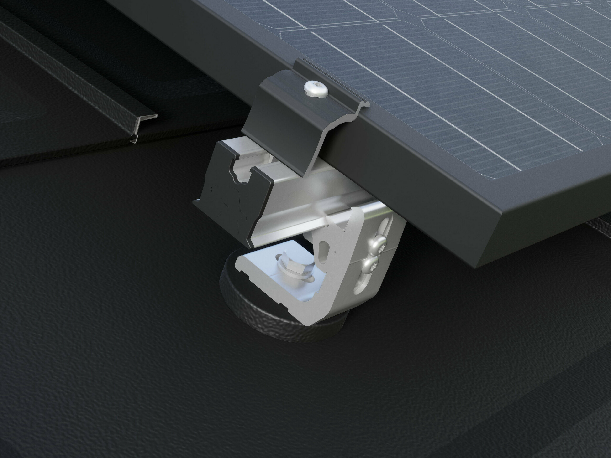 PREVARIO 3.S mounted on the PREFA R.16 roof tile Close-up of the PREVARIO 3.S solar bracket mounted on a dark PREFA roof, which supports the profile rail. The solar module was fastened to the profile rail using the PREVARIO end clamp.