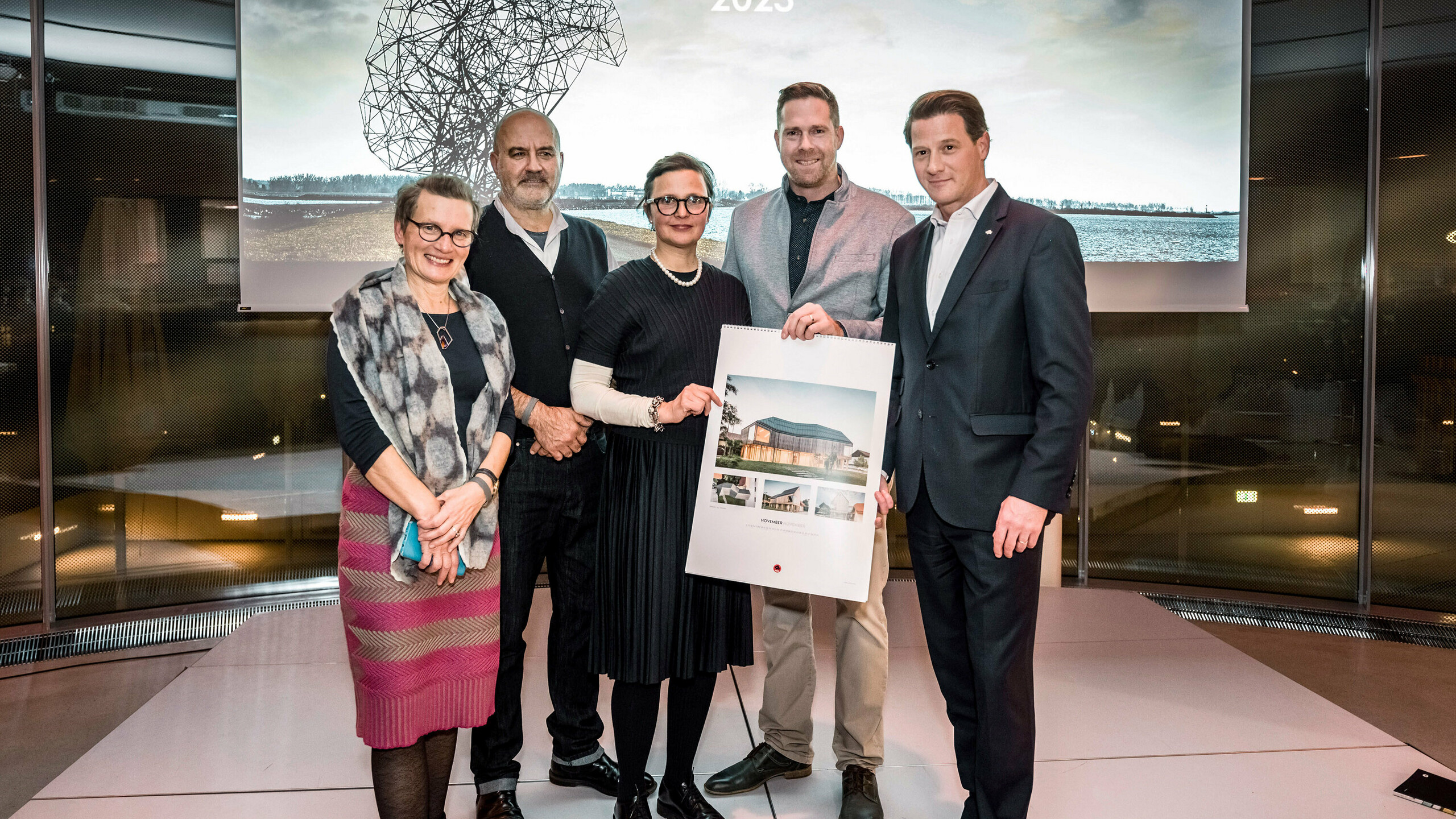 Architectural office Atelje Ostan Pavlin, Mitja Brencic holding the calendar, Leopold Pasquali.