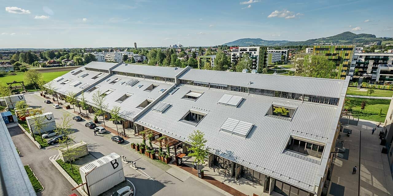 Aerial view of the Panzerhalle in Salzburg. The roof was newly covered with the PREFA roof tile in metallic silver.