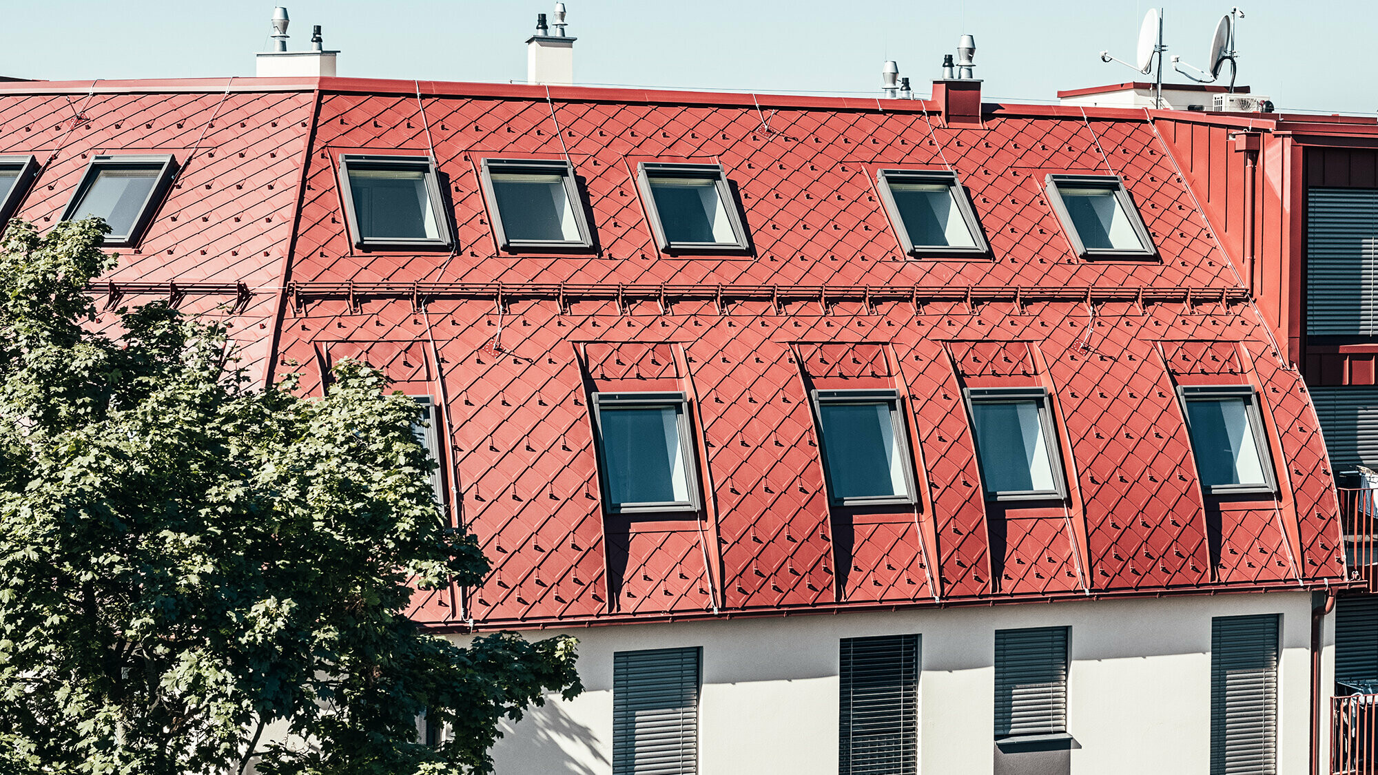 Various views and close-ups of the building's roofscape.