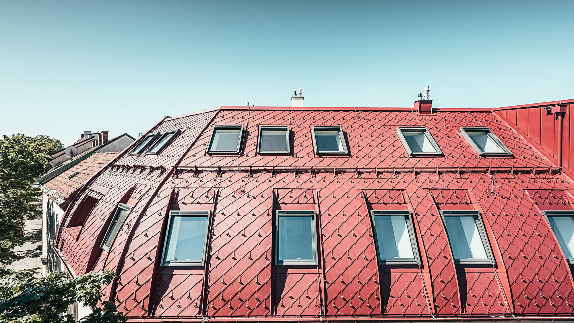 Various views and close-ups of the building's roofscape.