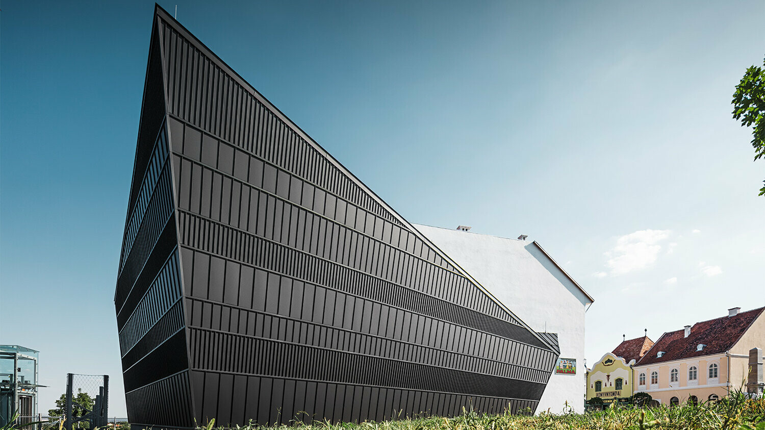 Side view of the building, from this perspective, part of it resembles a ship's bow.