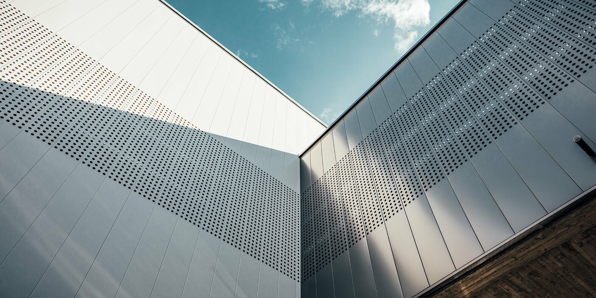 Close-up of the long siding panels on the ice rink.