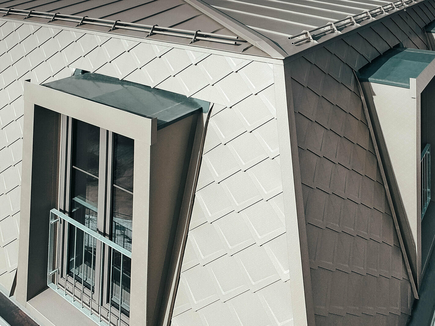 Detailed view of the PREFA rhomboid façade tile 29x29 in the colour bronze.
